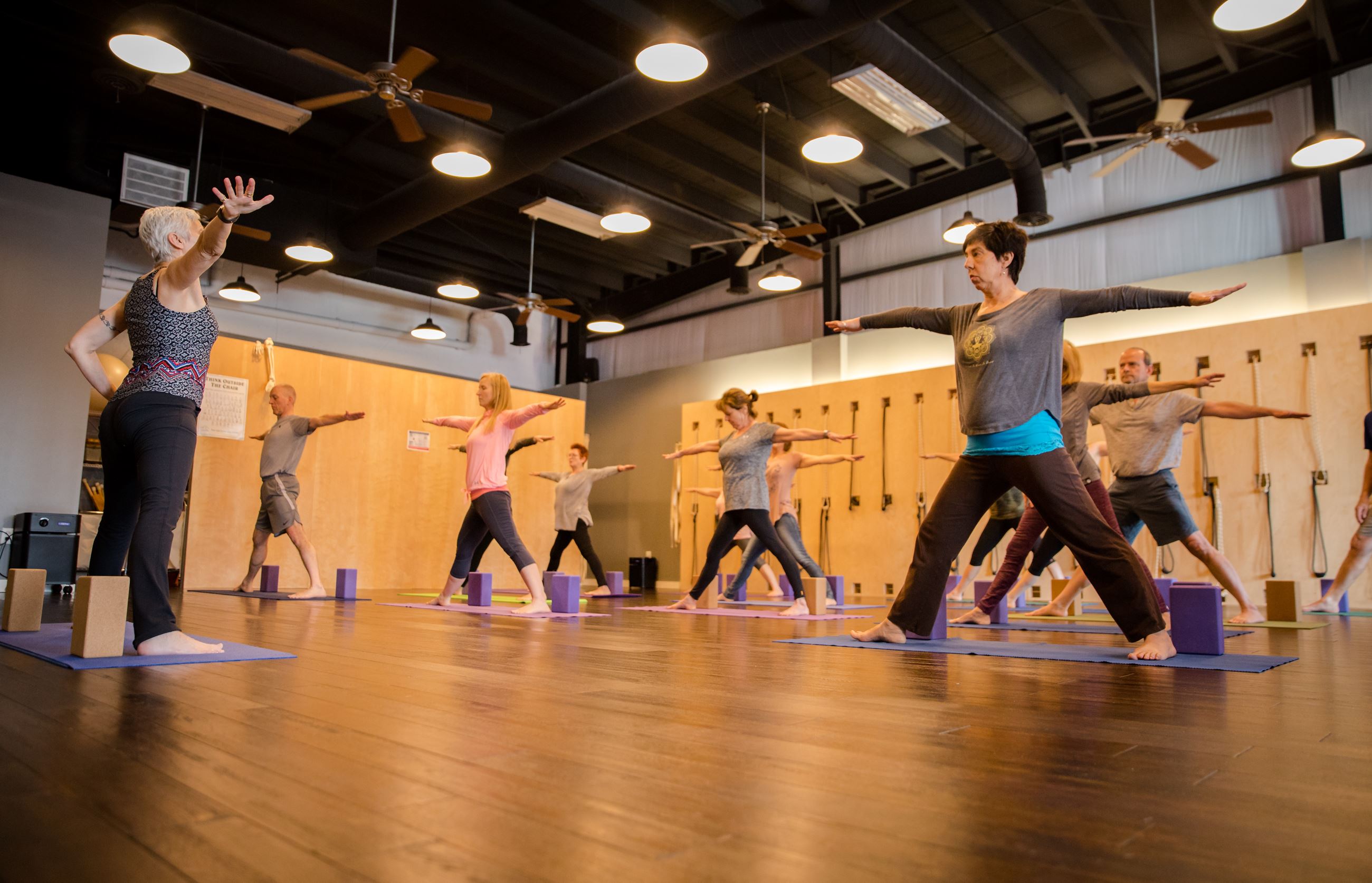 group of women doing a yoga class