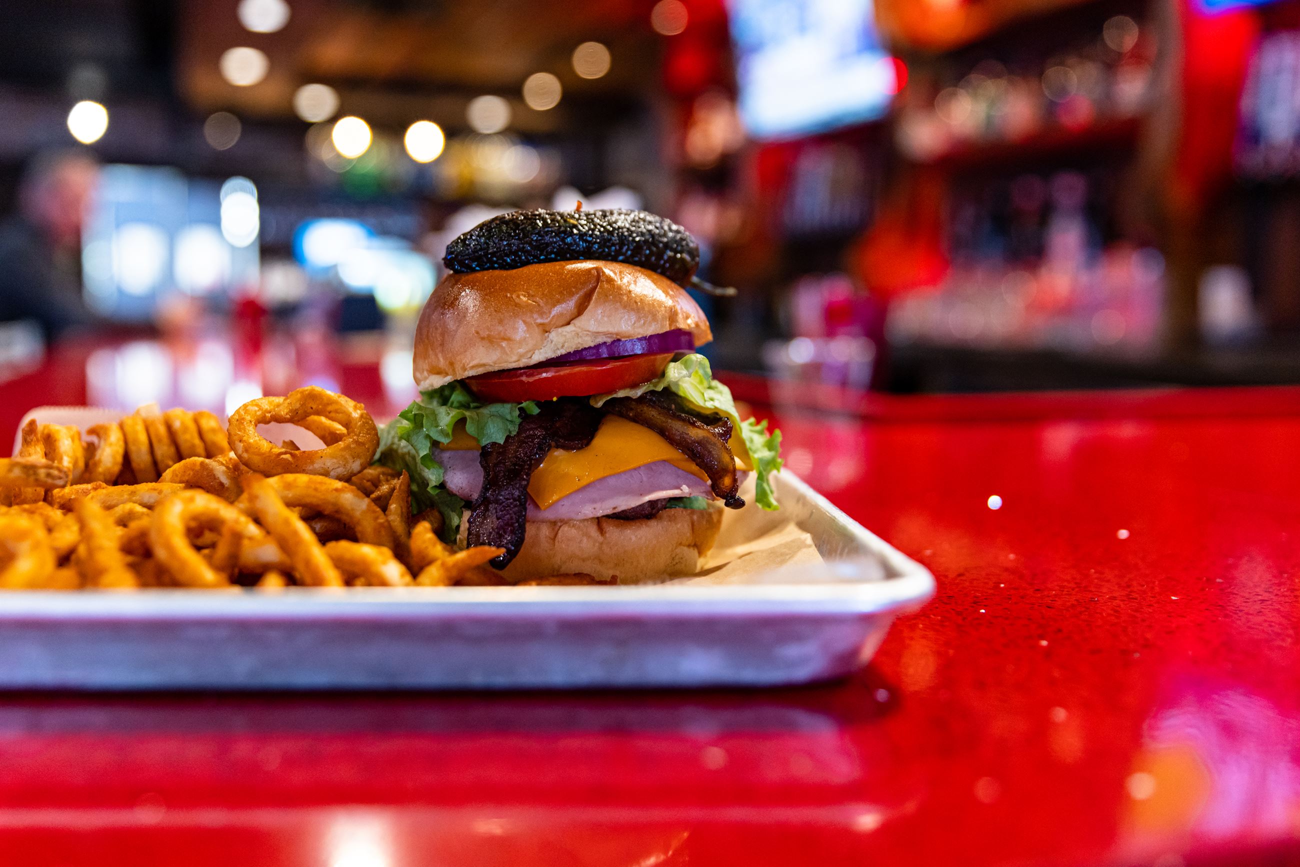 Burger with toppings and a side of fries